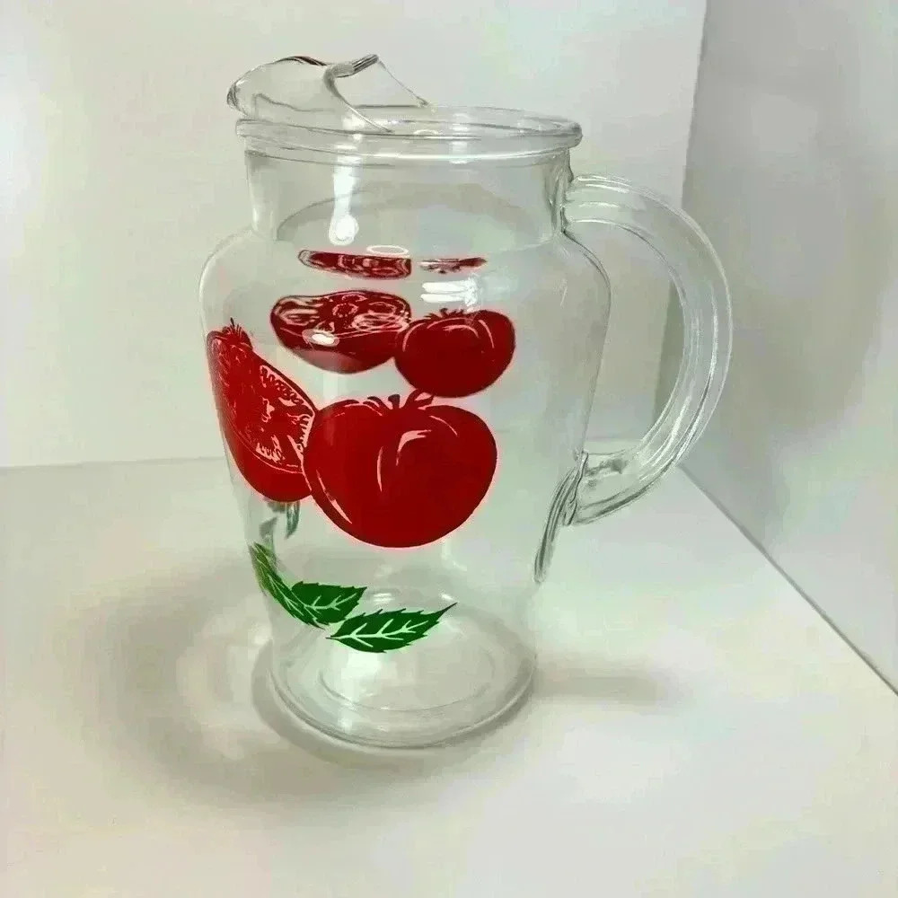Gorgeous midcentury small glass tomato juice pitcher with ice catcher spout